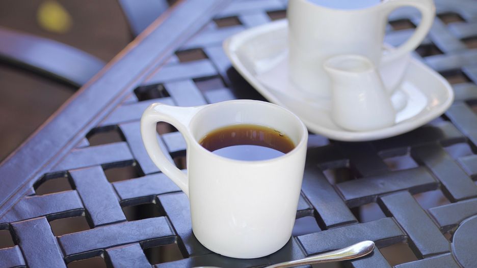 Radius Images Pub 45 2015 May
Two White Mugs of Tea on Patio Table with Milk and Spoon, Dundas, Ontario, Canada
