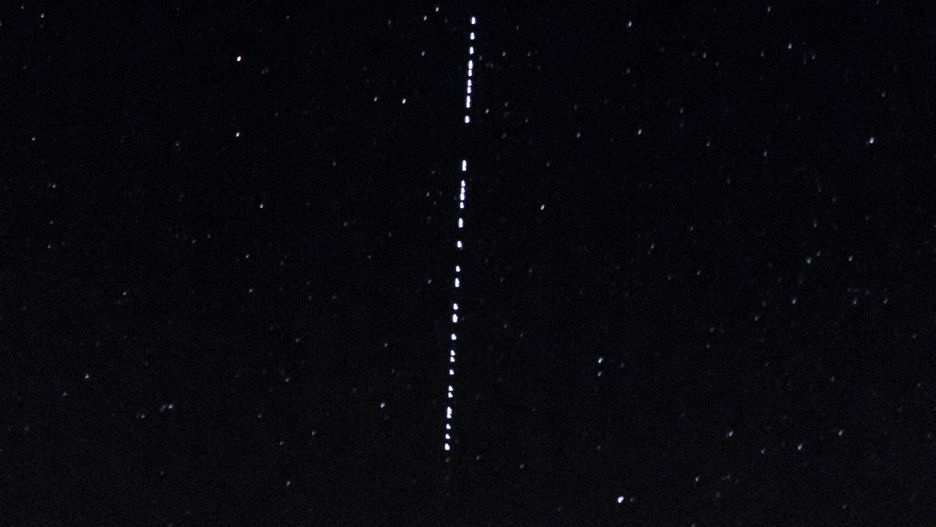 Starlink, Satellite internet constellation operated by SpaceX, on the sky of the Greek island of Amorgos, 24.07.2022 (Photo by Fabien Pallueau/NurPhoto via Getty Images)