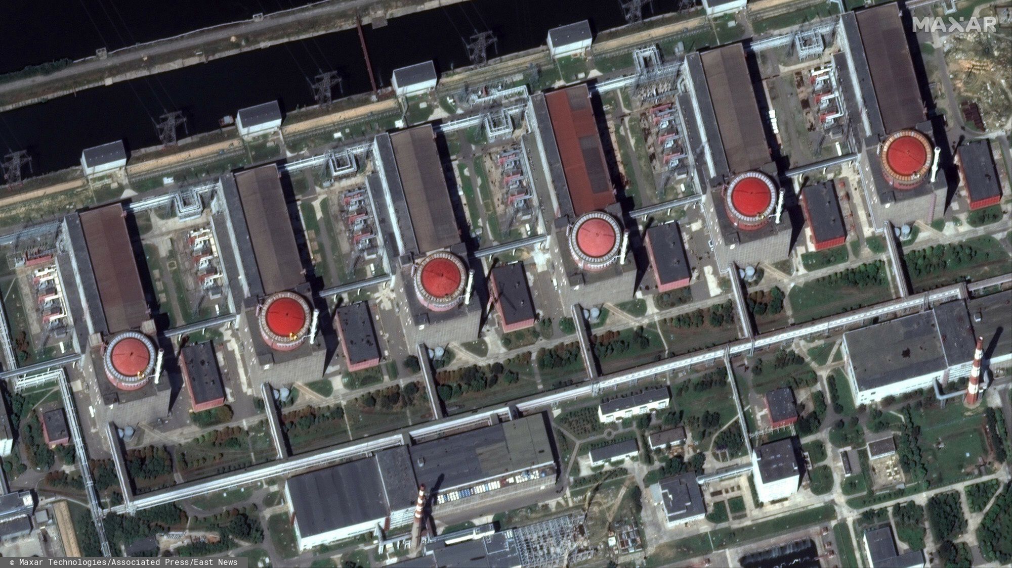 TemporaryThis satellite image provided by Maxar Technologies shows the six reactors of the Zaporizhzhia nuclear plant in Russian occupied Ukraine, Friday, Aug. 19, 2022. Kyiv and Moscow continued to accuse each other of shelling Europe?s largest nuclear power plant, stoking international fears of a catastrophe on the continent. (Satellite image �2022 Maxar Technologies via AP)Maxar Technologies