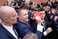 President elect Karol Nawrocki greets fans and supporters after his certification ceremony at the Royal Castle Square in Warsaw, Poland on 11 June, 2025. (Photo by Jaap Arriens/NurPhoto via Getty Images)