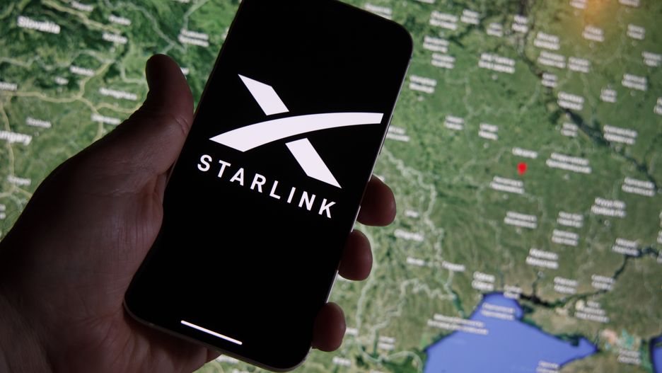 The Starlink photo is seen on a mobile device with Ukraine on a map in the background in this illustration photo in Warsaw, Poland on 21 September, 2022. Starlink owner and founder Elon Musk Starlink owner Elon Musk has decided to have the satellite company resume internet services in Ukraine after complaints of Starlink owner Elon Musk has decided to have the satellite company resume internet services in Ukraine after complaints of substantial costs. The satellite service, provided for free, is essential to the armed forces of Ukraine batteling Russian forces. (Photo by STR/NurPhoto via Getty Images)
