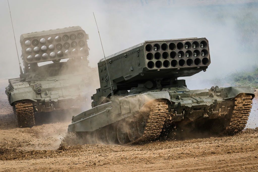 Russian Army  TOS-1A "Solntsepyok (Blazing Sun)" multiple
MOSCOW, RUSSIA - 2021/08/25: Russian Army  TOS-1A "Solntsepyok (Blazing Sun)" multiple rocket launcher and thermobaric weapon mounted on a T-72 tank chassis seen during the annual Army Games defense technology international exhibition.
The International Army Games is an annual Russian military sports event organized by the Ministry of Defense of Russia. The event, which was first staged in August 2015, involves close to 30 countries taking part in dozens of competitions over two weeks to prove which is the most skilled. Dynamic demonstration is a part of the Army Games public display. (Photo by Leonid Faerberg/SOPA Images/LightRocket via Getty Images)
SOPA Images
annual, armored, army games, blazing sun, defense technology, multiple rocket launcher, russian army, solntsepyok, t-72, tank, tank chassis, thermobaric weapon, tos-1a