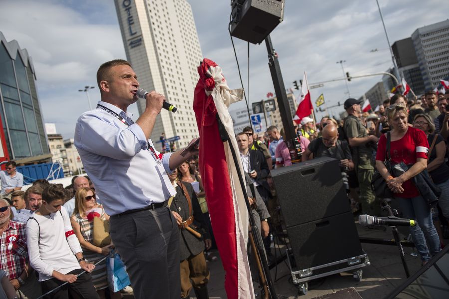 WARSAW, MAZOWIECKIE, POLAND - 2019/08/01: Robert Bakiewicz - the leader of the National Radical Camp (ONR)  speaks during the march.
Thousands of people took part in a march organised by the National Radical Camp (ONR) and other nationalist organizations to celebrate the 75th anniversary of the Warsaw Uprising.  
At the monument of the Insurgents of Warsaw, the March was blocked by the Antifascist and Citizens of the Republic of Poland (Obywatele RP), who were forcefully removed by the police. The Warsaw Uprising was the largest military operation by any resistance movement in Europe against the Nazi German occupiers during World War II. (Photo by Attila Husejnow/SOPA Images/LightRocket via Getty Images)