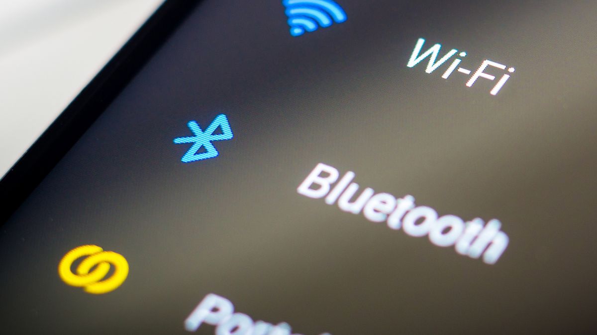 BRAZIL - 2020/10/18: In this photo illustration the detail of the Wi-Fi and Bluetooth connection icon seen displayed on a smartphone. (Photo Illustration by Rafael Henrique/SOPA Images/LightRocket via Getty Images)