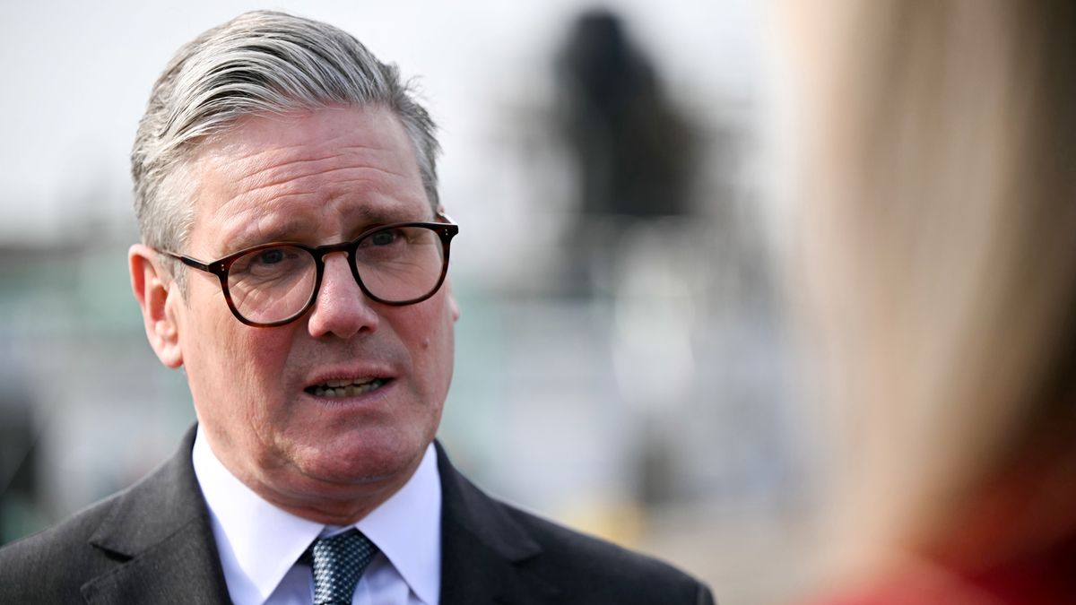 BARROW-IN-FURNESS, ENGLAND  - MARCH 20: Prime Minister Keir Starmer speaks to the media after addressing Royal Navy Submariners of the HMS Agamemnon nuclear submarine and BAE systems apprentices outside of the BAE systems factory on March 20, 2025 in Barrow-in-Furness, United Kingdom. The UK's existing nuclear deterrent program, or continuous at sea deterrent (CASD), is comprised of four Trident missile Vanguard Class Submarines, which are set to be replaced with four new Dreadnought Class submarines. Recently, the UK has come under pressure to decrease its dependence on America for the manufacturing and maintenance of its nuclear program, as US President Donald Trump casts doubt on the future of a US commitment to the NATO alliance.  (Photo by Oli Scarff - WPA Pool/Getty Images)