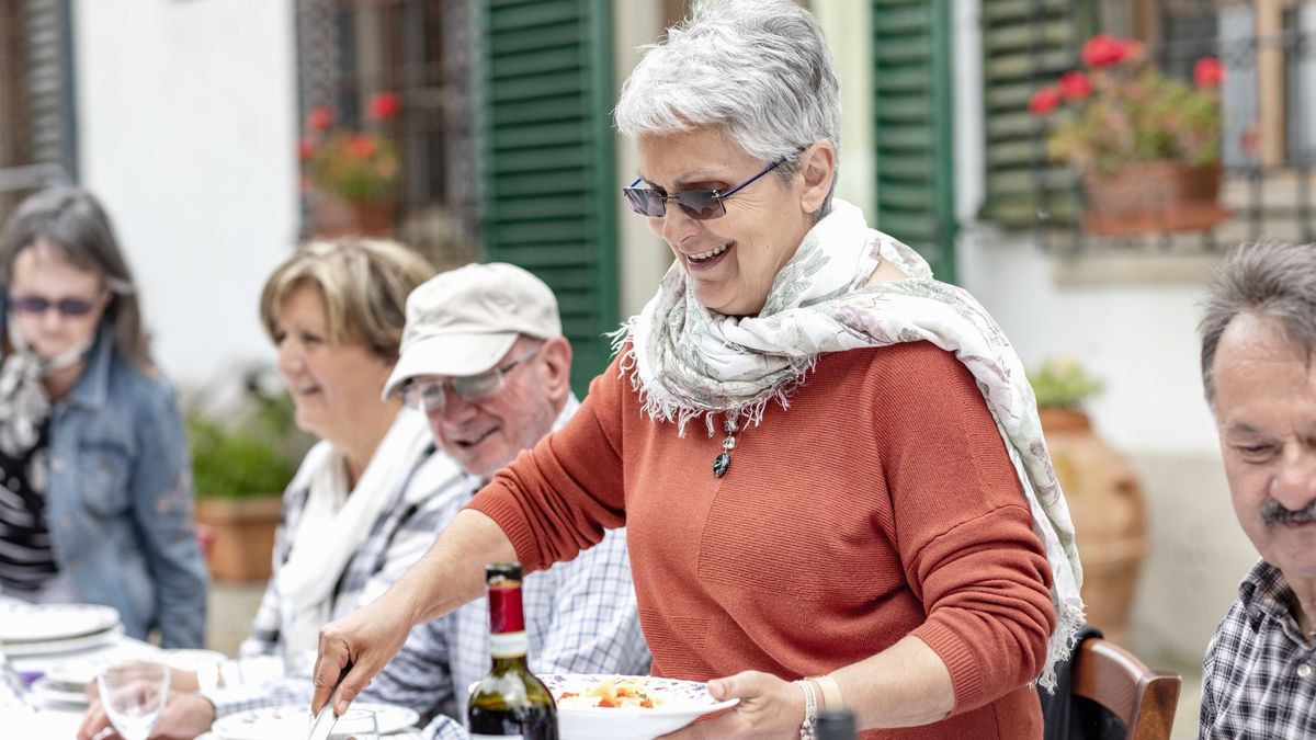 Woman serving pasta at family lunch in garden, Florence, Italy
Innocenti
both male and female, consuming food, couple, florence, garden, leisure, male, traditional culture, wood