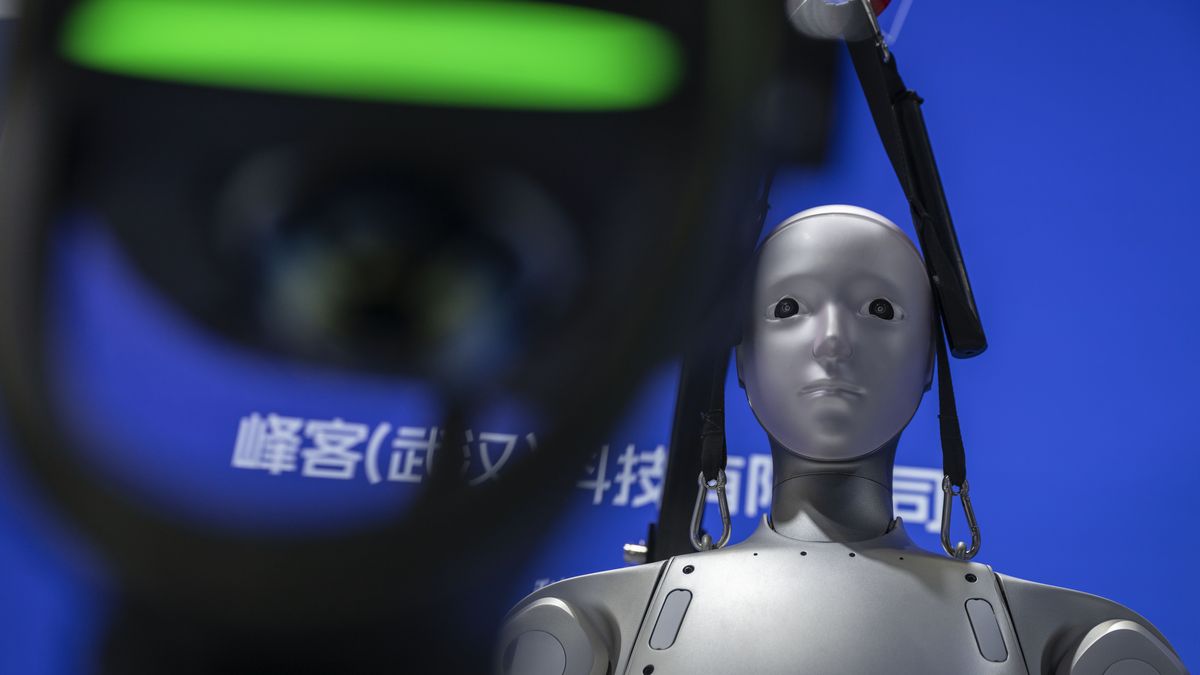 BEIJING, CHINA - JUNE 26: A humanoid robot is seen at a display at the Chinese International Supply Chain Expo (CISCE) on June 26, 2026 in Beijing, China. China is investing heavily in artificial intelligence and robotics, pouring billions of dollars into what the government sees as the country’s next economic engine. There are thousands of Chinese companies across a sprawling sector that includes humanoid robot and embodied intelligence, AI models, factory automation, and AI for autonomous systems.  China remains in a race with the United States for dominance in AI technologies with products that are cheaper to manufacture and have commercial appeal. (Photo by Kevin Frayer/Getty Images)