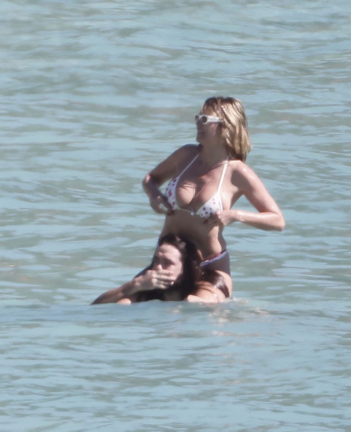 Heidi Klum hasa z mężem na plaży