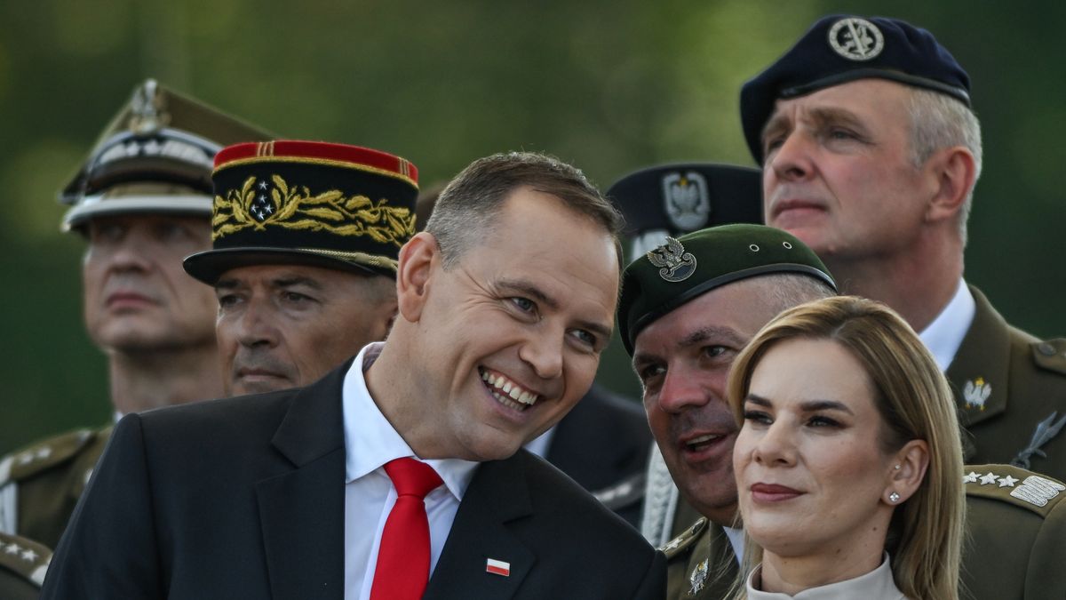 WARSAW, POLAND  AUGUST 15: 
President Karol Nawrocki and First Lady Marta Nawrocka seen at the Armed Forces Day parade, commemorating Poland's 1920 victory over the Soviet Red Army and marking the 105th anniversary of the Battle of Warsaw, in Warsaw, Poland, on August 15, 2025.
The event featured more than 4,000 Polish troops, about 200 soldiers from allied NATO nations, around 300 military vehicles, and nearly 50 aircraft, making it the largest parade in the country's history. (Photo by Artur Widak/NurPhoto via Getty Images)