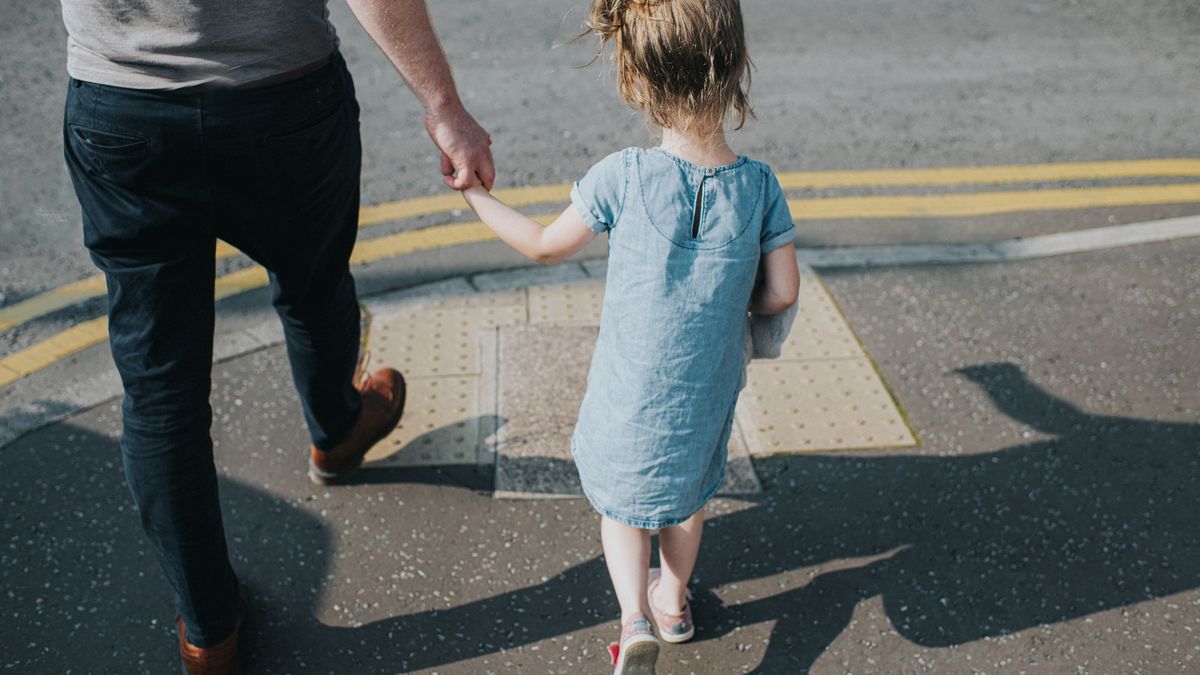 Little girl holding her Father's hand, about to cross a Road
Father and daughter walking along a footpath, in sun, casting shadows on the ground as they come to the edge of the footpath to cross the road. Double yellow lines and tarmac give a sense of a city.
Catherine Falls Commercial