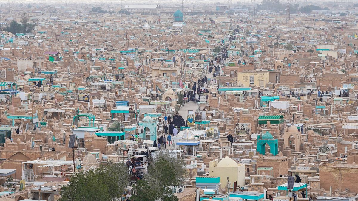 NAJAF, IRAQ - APRIL 10: An aerial view of Wadi-us-Salaam, the largest cemetery in the world, as Iraqis pray at the graves of their relatives during Eid al-Fitr in Najaf, Iraq on April 10, 2024. (Photo by Karar Essa/Anadolu via Getty Images)