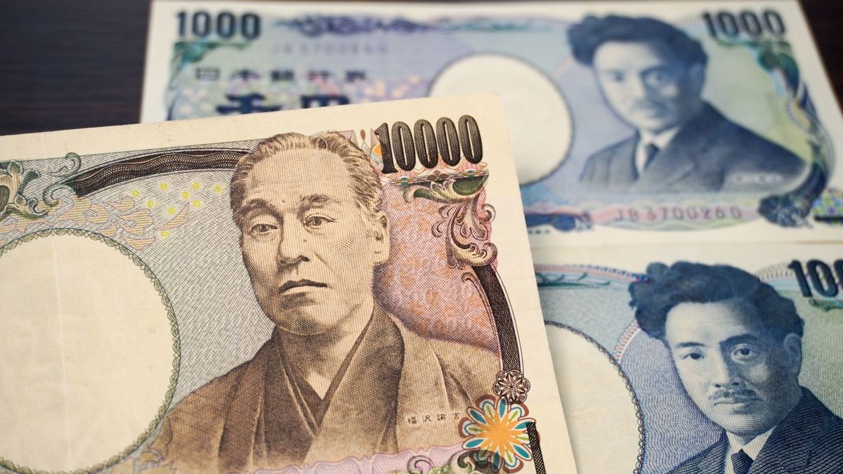 CHINA - 2026/03/29: A Japanese 10,000-yen banknote with Fukuzawa Yukichi in the foreground, partially obscuring a 1,000-yen note featuring Hideyo Noguchi. (Photo Illustration by Sheldon Cooper/SOPA Images/LightRocket via Getty Images)