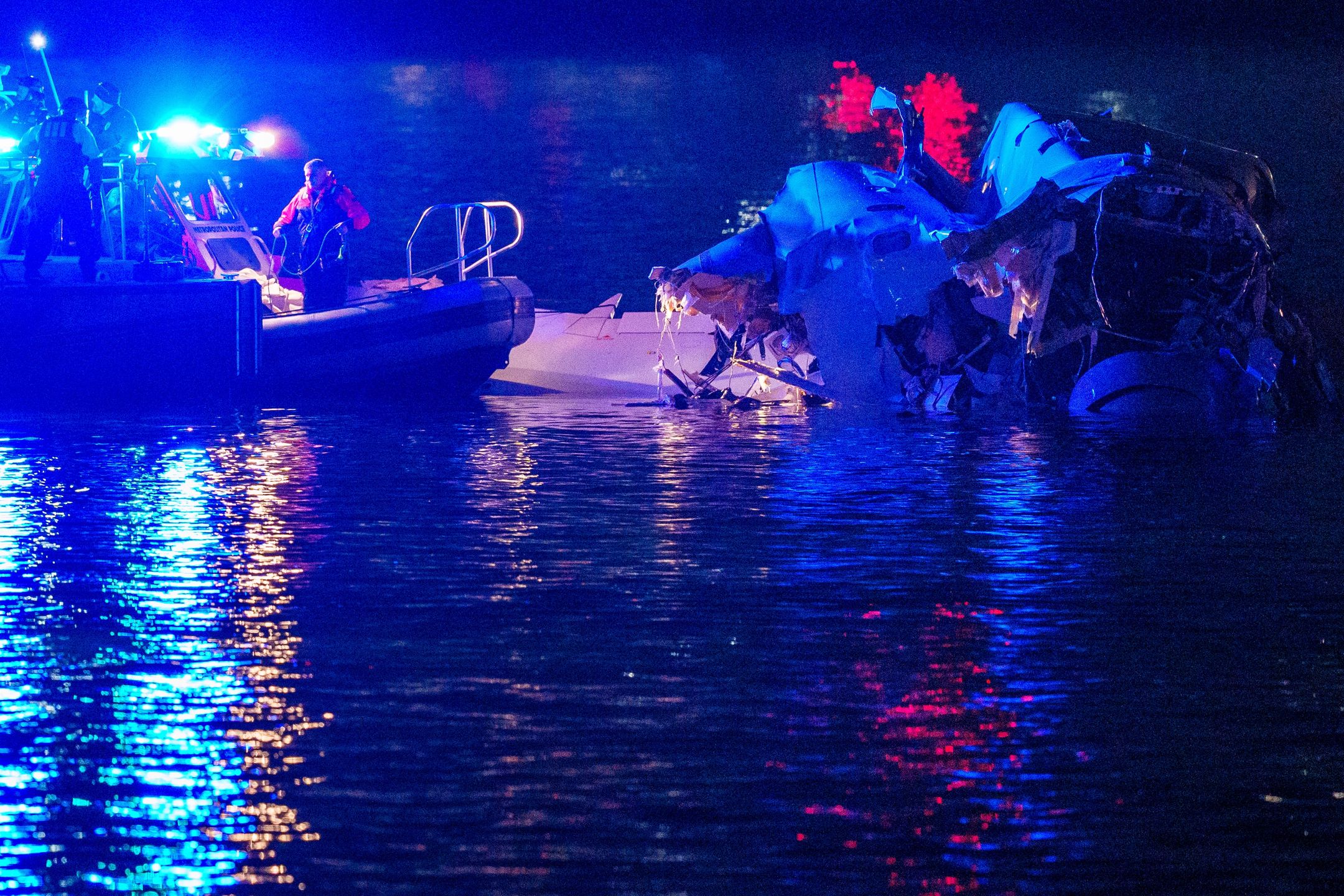 Emergency Crews Respond To Aircraft Crash Near Reagan National AirportARLINGTON, VIRGINIA - JANUARY 30: (EDITORS NOTE: Image contains graphic content) Emergency response teams including Washington, DC Fire and EMS, DC Police and others, assess airplane wreckage in the Potomac River near Ronald Reagan Washington Airport on January 30, 2025 in Arlington, Virginia. An American Airlines flight from Wichita, Kansas collided with a helicopter while approaching Ronald Reagan National Airport. (Photo by Andrew Harnik/Getty Images)Andrew Harnik