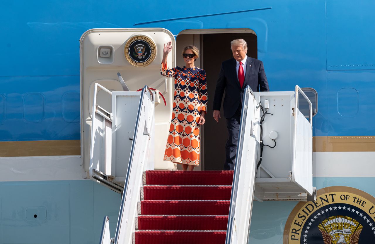 WEST PALM BEACH, FLORIDA - JANUARY 20: Outgoing U.S. President Donald Trump and First Lady Melania Trump exit Air Force One at the Palm Beach International Airport on the way to Mar-a-Lago Club on January 20, 2020 in West Palm Beach, Florida. Trump left Washington, DC on the last day of his administration before Joe Biden was sworn-in as the 46th president of the United States. (Photo by Noam Galai/Getty Images)