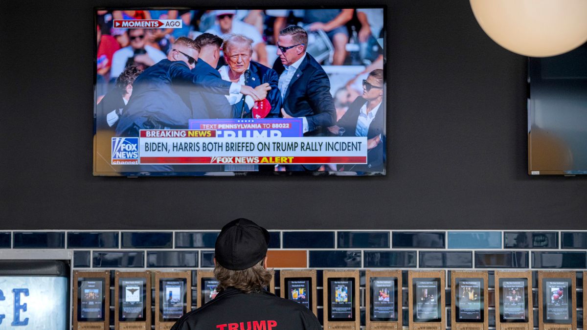 A monitor displays news from former US President Donald Trump's rally, ahead of the Republican National Convention (RNC) in Milwaukee, Wisconsin, US, on Saturday, July 13, 2024. Former President Donald Trump is being evaluated at a medical facility but is "fine" after an incident where he was rushed off stage during rally in Butler, Pennsylvania, his campaign said. Photographer: David Paul Morris/Bloomberg via Getty Images