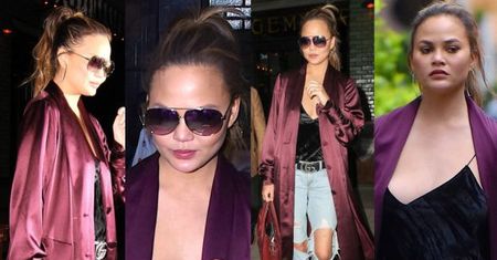 Chrissy Teigen w długim, satynowym szlafroku