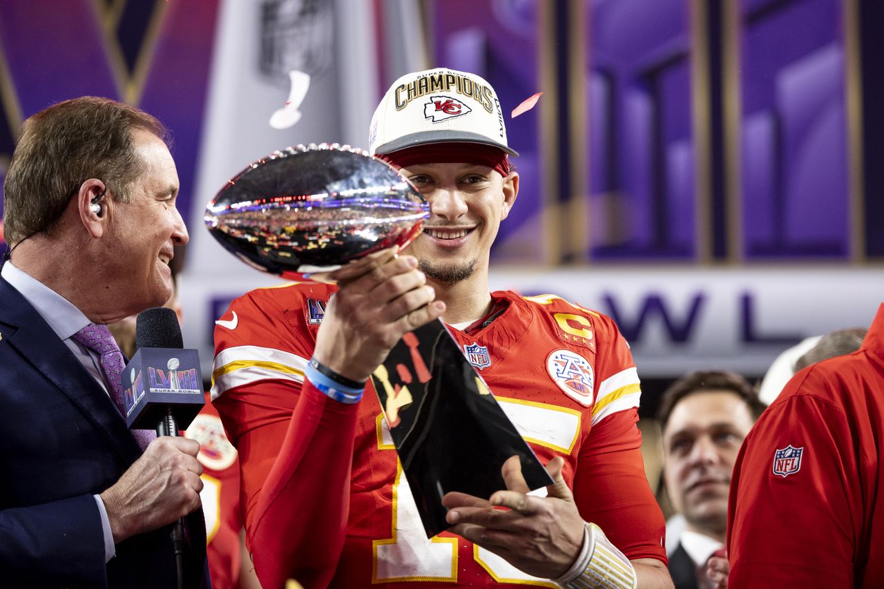 LAS VEGAS, NEVADA - FEBRUARY 11: Patrick Mahomes #15 of the Kansas City Chiefs celebrates with the Vince Lombardi Trophy following the NFL Super Bowl 58 football game between the San Francisco 49ers and the Kansas City Chiefs at Allegiant Stadium on February 11, 2024 in Las Vegas, Nevada. (Photo by Michael Owens/Getty Images)