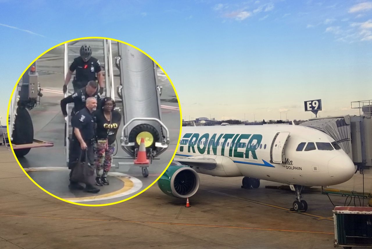 The traveller was escorted off the plane.