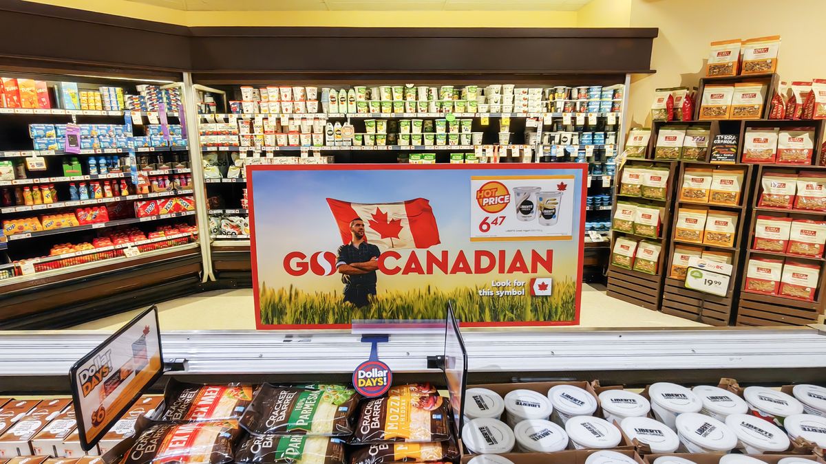 VANCOUVER, CANADA - MARCH 28: Products on the shelves are labelled with the Canadian flag tags at a supermarket on March 28, 2025 in Vancouver, Canada. In response to US President Donald Trump's tariff threats, Canadians  have adopted a "Buy Canada" approach, choosing domestic goods over American ones and canceling trips south of the border. (Photo by VCG/VCG via Getty Images)