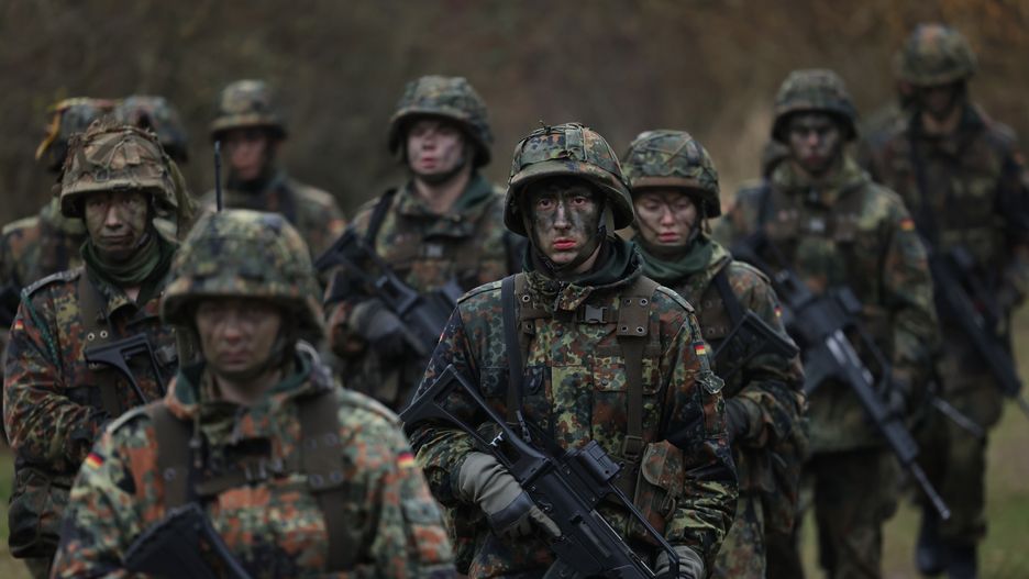 PRENZLAU, GERMANY - NOVEMBER 29: New army (Heer) recruits of the Bundeswehr, Germany's armed forces, participate in basic training on November 29, 2022 near Prenzlau, Germany. German Chancellor Olaf Scholz, following Russia's invasion of Ukraine, pledged to create a special fund of EUR 100 billion to invest in Germany's armed forces, which will go to both high tickets investments like modern attack aircraft and transport helicopters but also into improved preparedness of existing equipment.  (Photo by Sean Gallup/Getty Images)