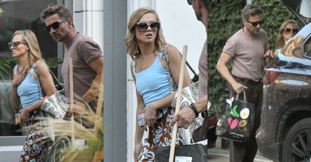 Przejęta Agnieszka Kaczorowska i Marcin Rogacewicz wracają z długiego treningu. W oczy rzucało się ich uszkodzone auto