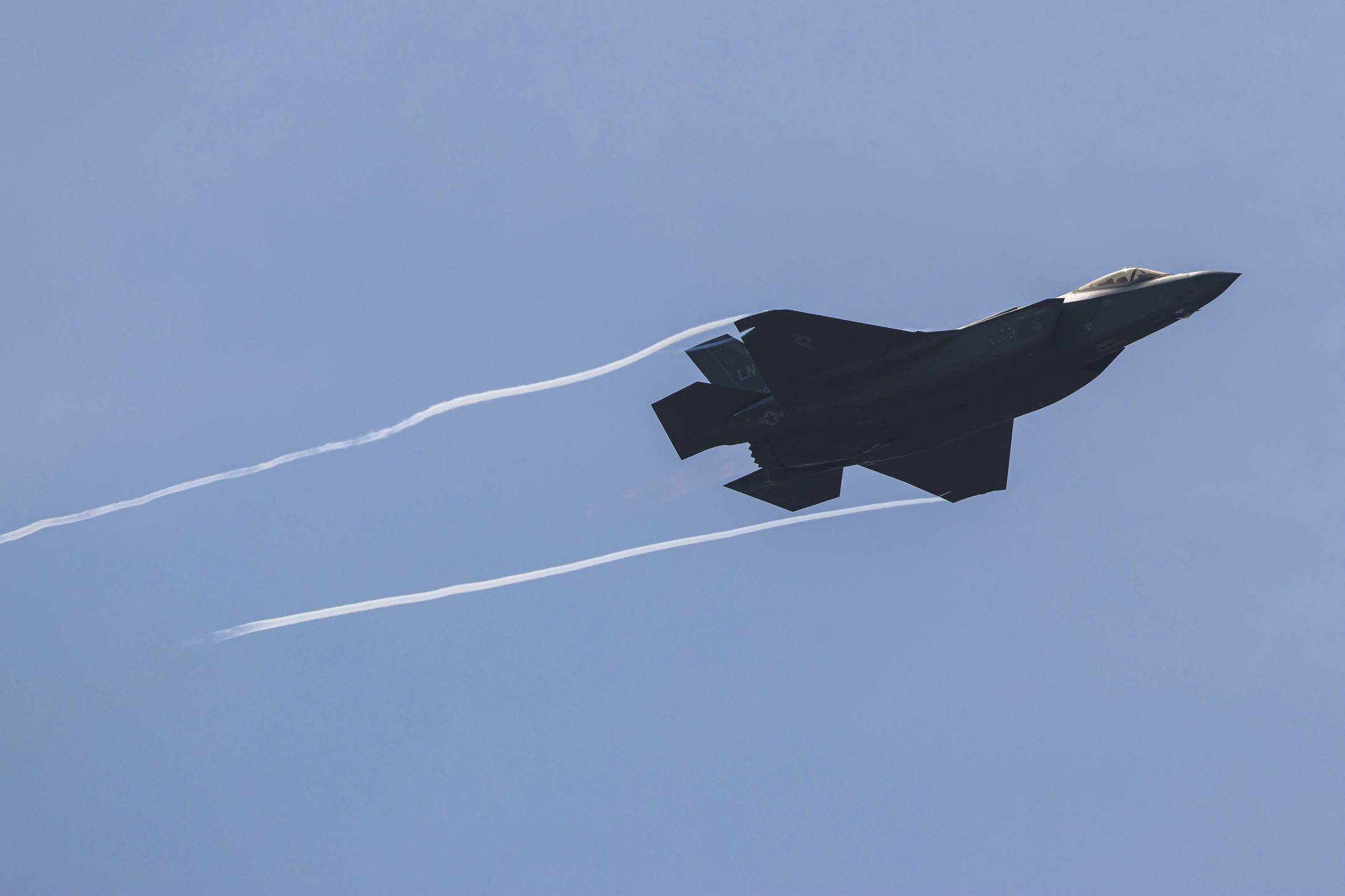 Lockheed Martin F-35 Lightning II a fifth generation fighter jet during a flight demonstration at Paris Air Show 2025 at Le Bourget Airport. The F35 is a multirole combat aircraft, an American made single seat, single engine, supersonic stealth strike fighter designed for air superiority, strike missions, electronic warfare,  intelligence, surveillance and reconnaissance. The specific fighting jet belongs to the United States Air Force with serial number AF-350 and registration tail number 20-5590 assigned to the 495th Fighter Squadron (495 FS) of the 48th Fighter Wing (48 FW), stationed at RAF Lakenheath in England.. The variant of the military plane is the standard version, F-35A made for conventional takeoff and landing CTOL.  Paris, France on June 22, 2025 (Photo by Nicolas Economou/NurPhoto via Getty Images)