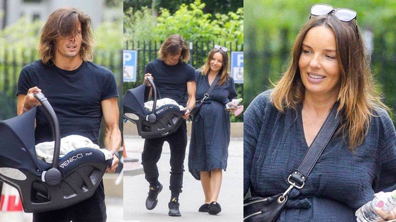 Agnieszka Włodarczyk i Robert Karaś wychodzą z dzieckiem ze szpitala 