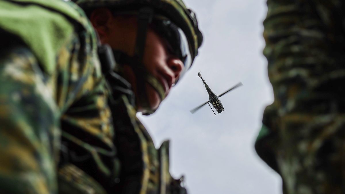 TAICHUNG, TAIWAN - JULY 16: A Taiwanese reconnaissance soldier controls a Taiwan-made tactical short-range surveillance drone, during a deep battle exercise simulating how to curb invading forces from pushing forward, as part of the ongoing Han Kuang military exercise, on the outskirts in Taichung, Taiwan, on July 16, 2025. The exercise mobilises multiple CM-11 Tanks, CM-32 and CM-34 Armored Vehicles, tactical short-range unmanned aerial drones (UAV), as well as ground troops to simulate a deep operation to slow down enemy's movements and weaken their combat capabilities in the event of Chinese invasion of the self-governing island. The drill comes after 38 Chinese Liberation Army's warplanes and UAVs today (July 16) were detected crossing Taiwan's air defense identification zone. (Photo by Daniel Ceng/Anadolu via Getty Images)