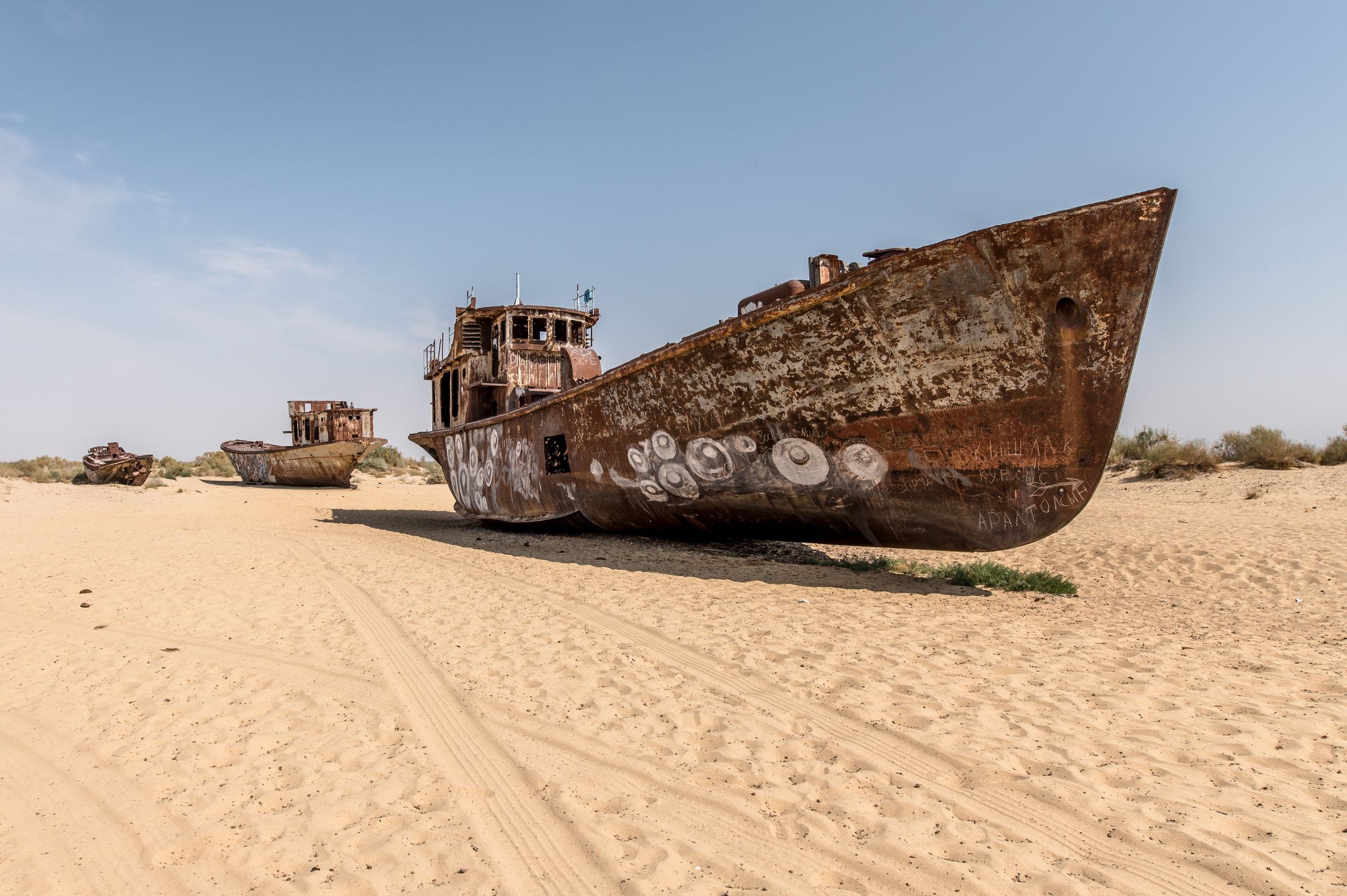 abandoned, apocalypse, aral, asia, catastrophe, cemetery, climate, climate change, desert, desertification, desolation, devastation, disaster, dry, dryness, dune, ecological, ecology, environment, environmental, global, graveyard, karakalpakstan, kazakhstan, landscape, mo'ynaq, moynaq, moʻynoq, mujnak, muynak, natural, nature, qaraqalpaqstan, rust, rusting, rusty, sand, scrapyard, sea, ship, ship-wreck, ships, shipwreck, skeleton, soviet, travel, uzbekistan, warming, wreck, wreckage