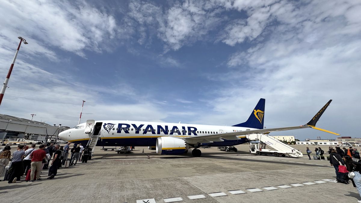 CAGLIARI, SARDINIA - MAY 03: (EDITORS NOTE: Image taken with a mobile phone) Passengers board a Ryanair Boeing 737 MAX 8-200 EI-IHX at Cagliari International Elmas Airport on May 03, 2025 in Cagliari, Italy. (Photo by John Keeble/Getty Images)