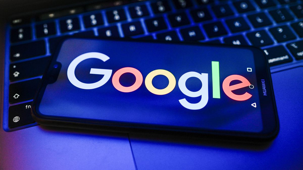 POLAND - 2026/04/23: In this photo illustration, the Google logo is displayed on a smartphone on the top of a laptop. (Photo Illustration by Omar Marques/SOPA Images/LightRocket via Getty Images)