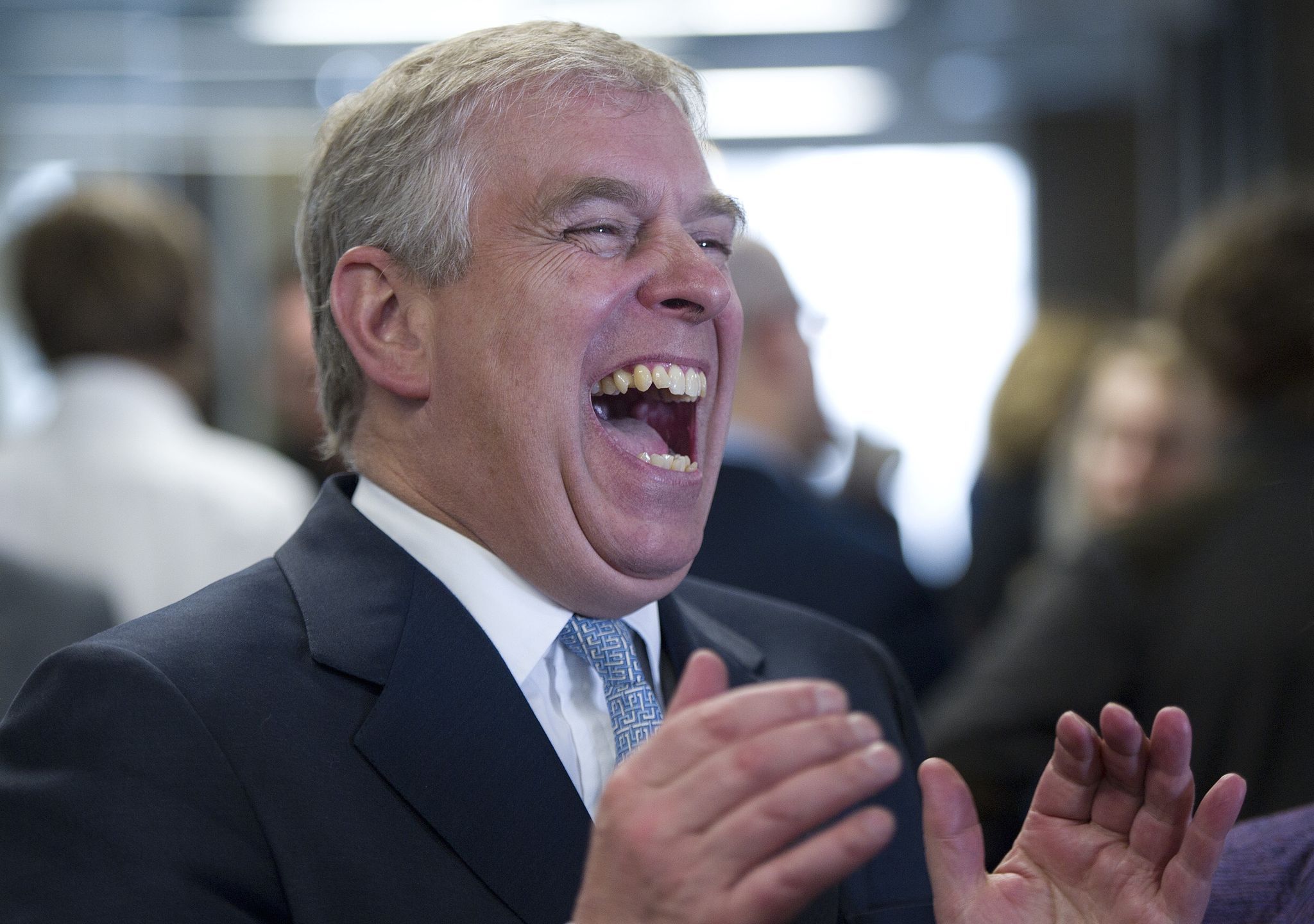 Duke of York Visits YammerLONDON, UNITED KINGDOM - MARCH 13: Prince Andrew, Duke of York speaks with staff as he visits 'Yammer' a enterprise social network based in Great Eastern Street on March 13, 2013 in London, England. (Photo by Geoff Pugh - WPA Pool/Getty Images)WPA Poollaughing