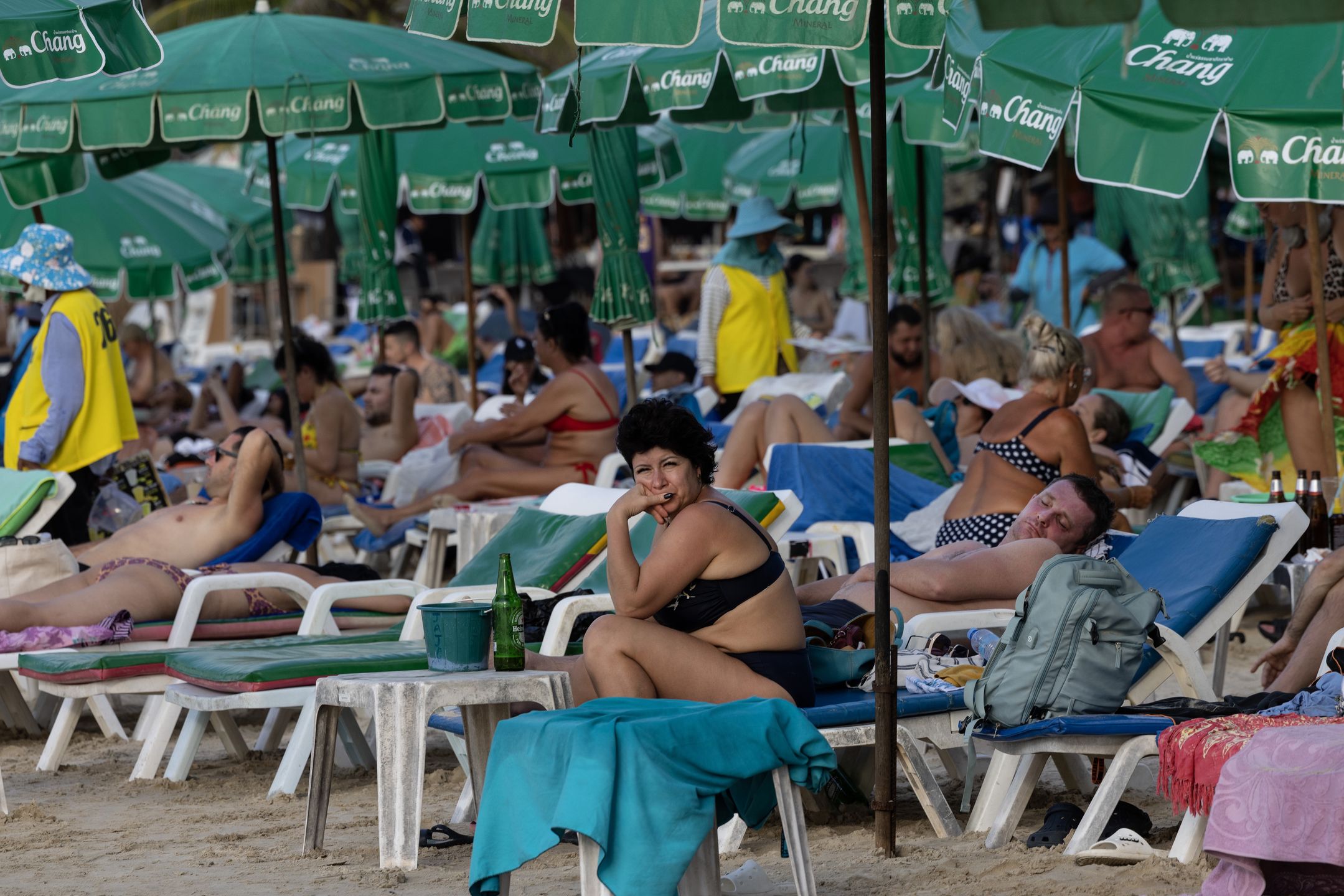 PHUKET, THAILAND - DECEMBER 16: Russian tourists are seen along Patong beach on December 16, 2022 in Phuket, Thailand. Russians have been flocking to Phuket after direct flights from Russia resumed at the end of October. Russian men left their country, worried about being drafted into the military to fight Putin's war. Well over 7,000 Russian tourists are stranded in Thailand as Ukraine war sanctions target Moscow. (Photo by Paula Bronstein/ Getty Images)