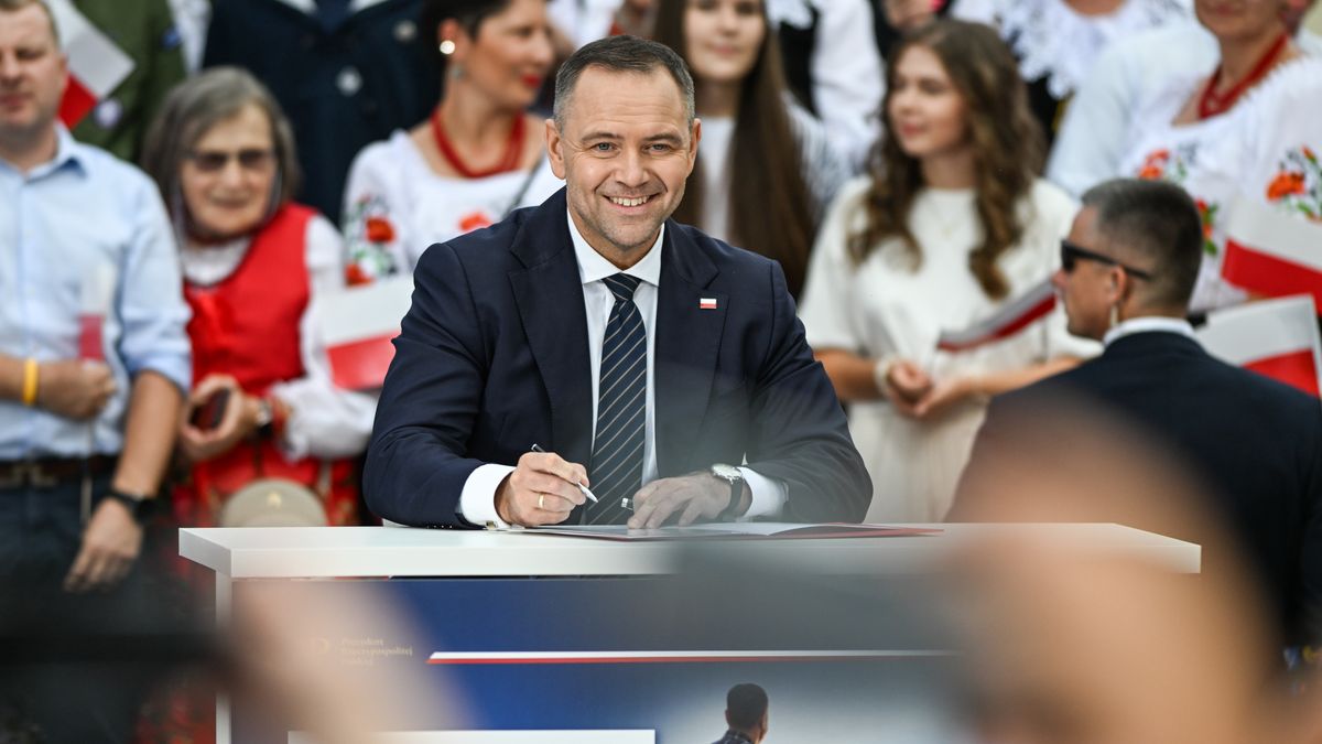 KOLBUSZOWA, POLAND  AUGUST 8: 
Newly sworn-in President of Poland, Karol Nawrocki, signs a legislative initiative on the zero PIT (personal income tax) project for families with two or more children during a meeting with residents in Kolbuszowa, Subcarpathian Voivodeship, Poland, on August 8, 2025. (Photo by Artur Widak/NurPhoto via Getty Images)