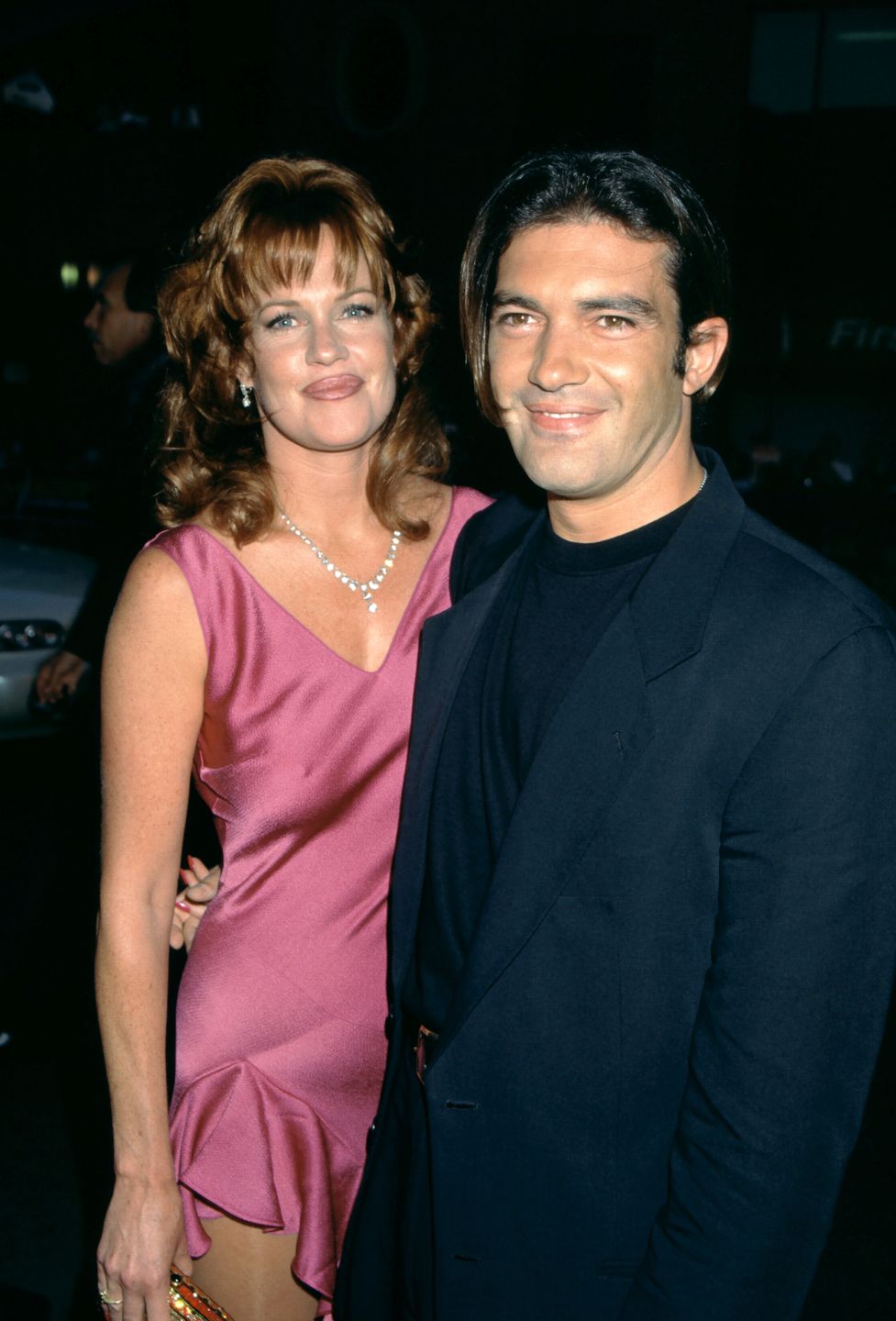 1995 "Desperado" Westwood PremiereWESTWOOD, CA - AUGUST 21: Actress Melanie Griffith and boyfriend, actor Antonio Banderas attend the "Desperado" Westwood Premiere on August 21, 1995 at the Mann National Theatre in Westwood, California.  (Photo by Ron Davis/Getty Images)Ron DavisAttend, Poses, RonDavis_Archives, Smiles