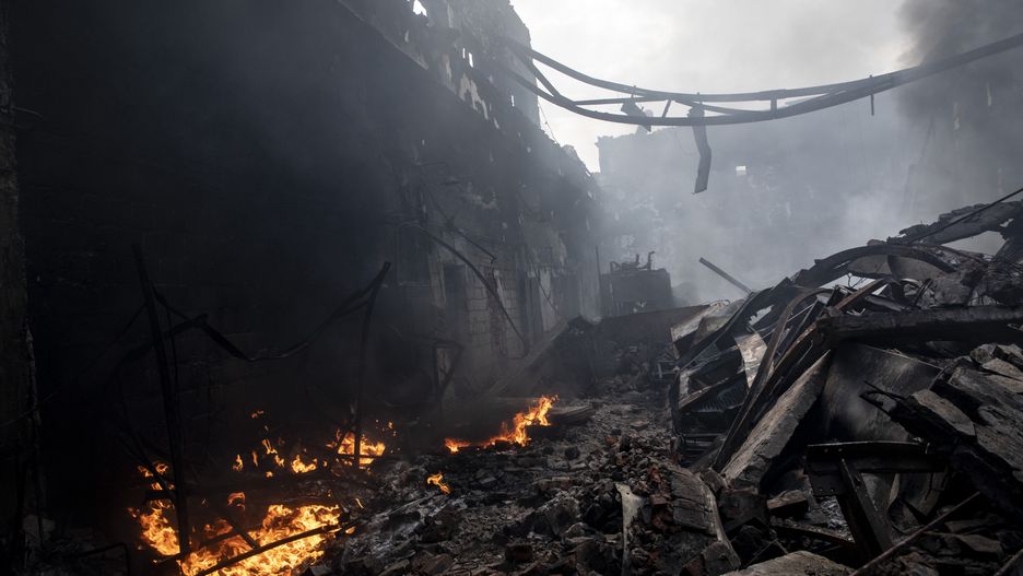 KHARKIV, UKRAINE - 2022/04/30: Burning fuel in the ruins after a Russian shelling hit a petroleum storage depot in Kharkiv. As Russia has re-supply its troops and concentrated the offensive on the eastern part of Ukraine, Kharkiv, the second biggest city in Ukraine now under constant threat of Russian bombardment and airstrikes. (Photo by Alex Chan Tsz Yuk/SOPA Images/LightRocket via Getty Images)