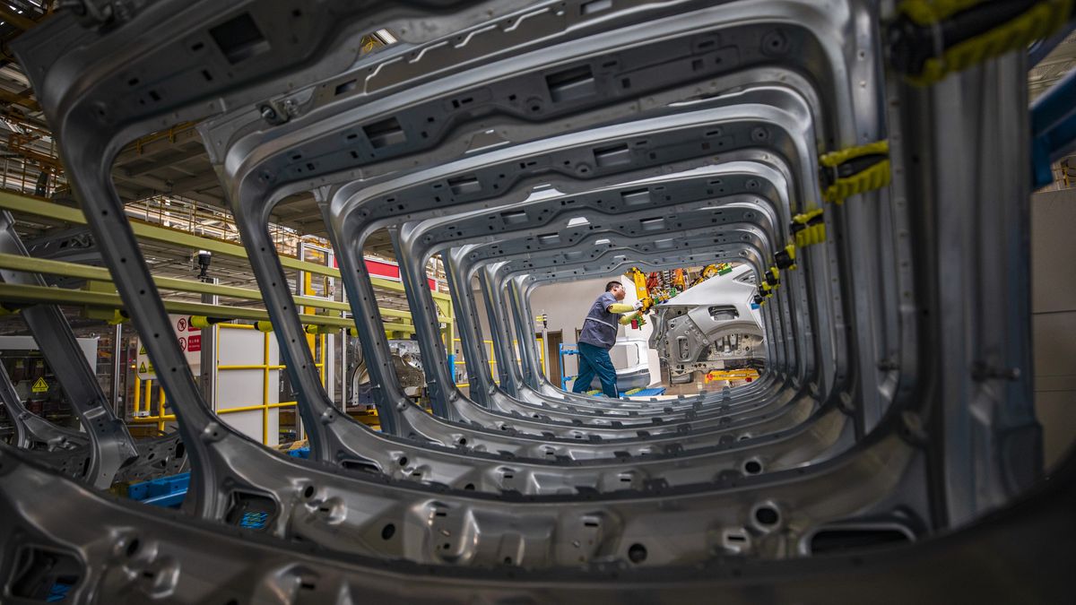 HEFEI, CHINA - SEPTEMBER 25 2024: A man works on an assembly of electric cars at a new production base of Volkswagen Anhui in Hefei city in central China's Anhui province. (Photo credit should read YUAN ZHENG / Feature China/Future Publishing via Getty Images)