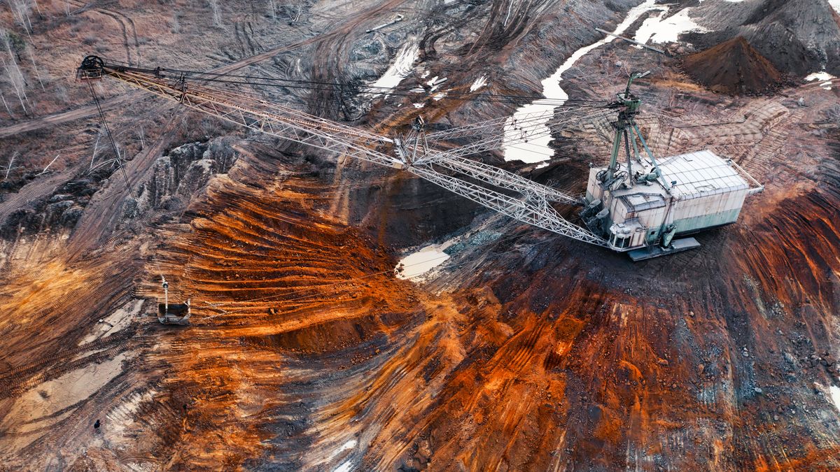 A large walking excavator works in a quarry for the extraction of rare metals.
A large walking excavator works in a quarry for the extraction of rare metals. Drone view. Industrial landscape.
construction, excavator, site, quarry, yellow, large, work, heavy, sand, soil, scoop, road, sky, excavation, shovel, vehicle, hydraulic, gravel, power, dig, mine, backhoe, digger, earth, mover, bulldozer, equipment, machinery, industrial, build, moving, dirt, loader, industry, earthmover, excavate, excavating, ground, activity, dredger, machine, earthwork, outdoors, development, building, background, bucket, tractor, sunset, engineering, construction, excavator, site, quarry, yellow, large, work, heavy, sand, soil, scoop, road, sky, excavation, shovel, vehicle, hydraulic, gravel, power, dig, mine, backhoe, digger, earth, mover, bulldozer, equipment, machinery, industrial, build, moving, dirt, loader, industry, earthmover, excavate, excavating, ground, activity, dredger, machine, earthwork, outdoors, development, building, background, bucket, tractor, sunset