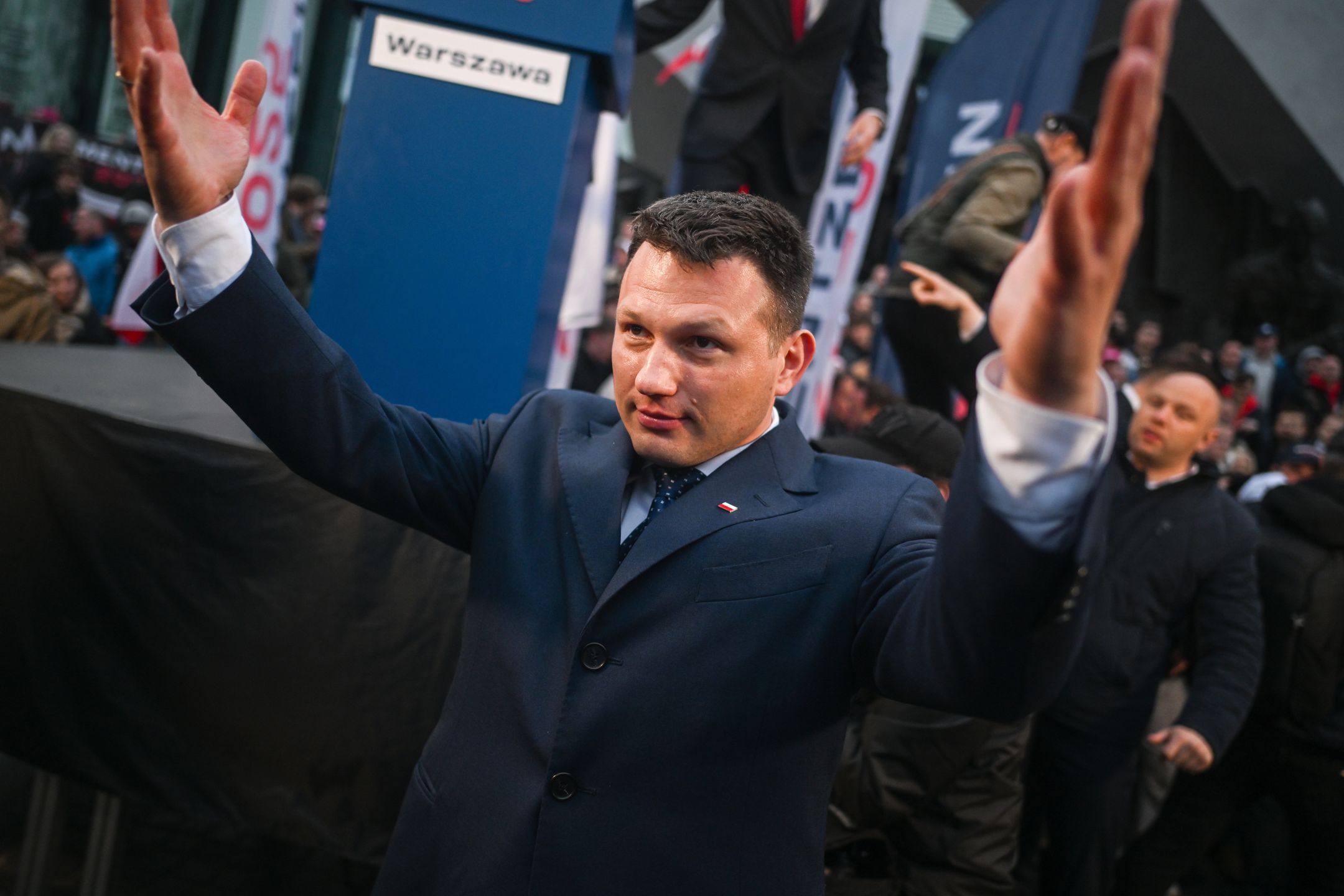 WARSAW, POLAND - MAY 10: Presidential Candidate for the far right wing Confederation Party, Slawomir Mentzen gesticulates as he walks to meet with supporters after delivering a speech during a presidential campaign rally on May 10, 2025 in Warsaw, Poland. The presidential election in Poland will be held on May 18. (Photo by Omar Marques/Getty Images)
