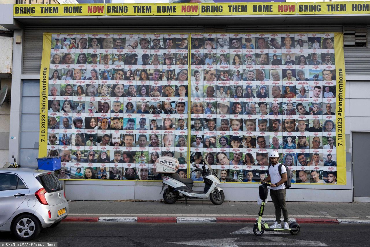 Tel Aviv. On this wall, there are photos of people still being held by Hamas after the 7th October attack.