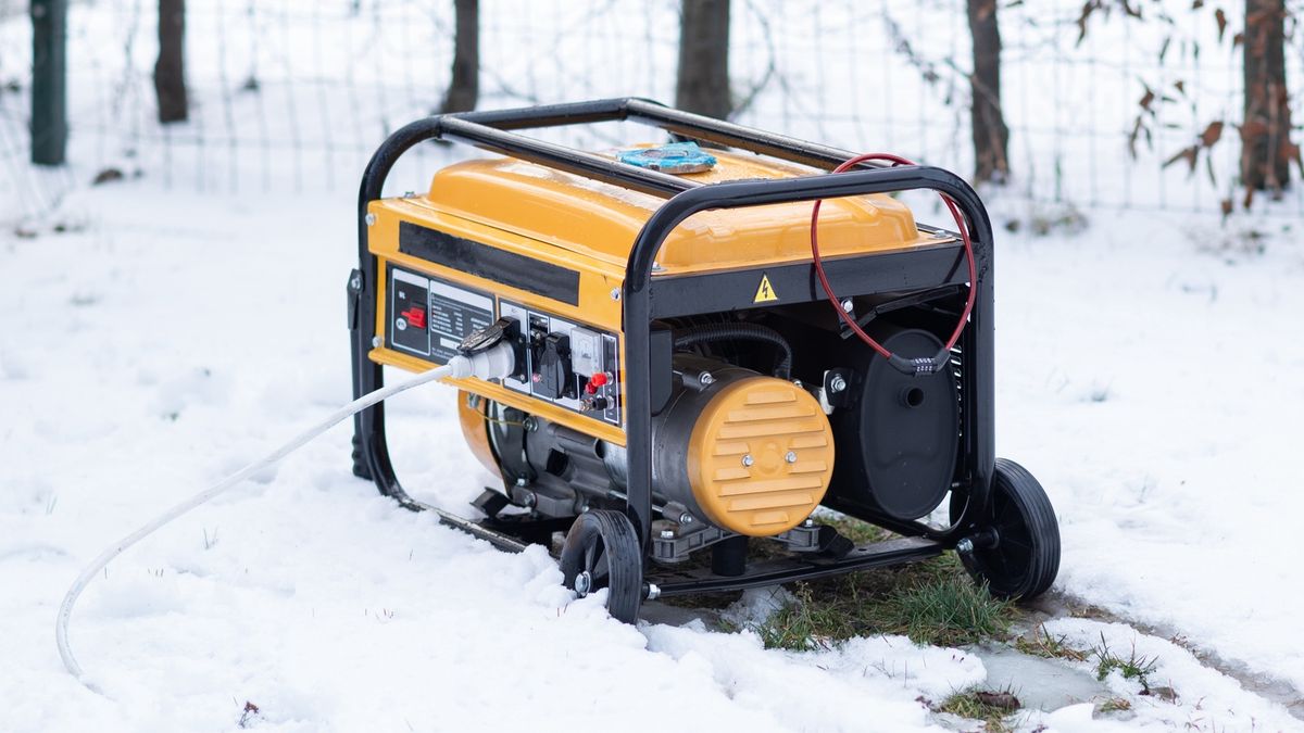 Yellow portable gasoline generator providing backup power in a snowy outdoor setting during winter.Yellow portable gasoline generator providing backup power in a snowy outdoor setting during winter.Yaroslav Litunsource, supply, residential, current, freezing, infrastructure, commercial, yard, hardware, device, utility, maintenance, voltage, work, fuel, tool