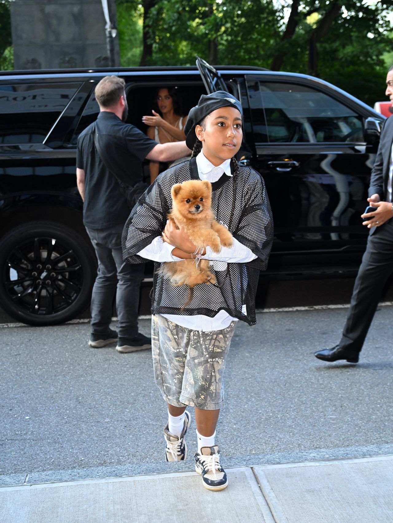 NEW YORK, NEW YORK - AUGUST 14: Kim Kardashian and North West are seen in Midtown Manhattan on August 14, 2024 in New York City. (Photo by James Devaney/GC Images)