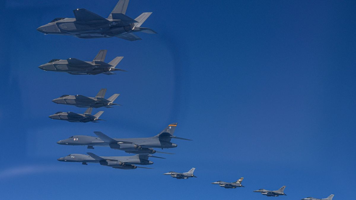 UNDISCLOSED LOCATION, SOUTH KOREA - MARCH 19: In this handout image released by the South Korean Defense Ministry, two US Air Force B-1B bombers (C) flying over South Korea with South Korean Air Force F-35A (top L) and US Air Force F-16 (bottom) fighter jets during a combined air drill on March 19, 2023 at an undisclosed location in South Korea. U.S. B-1B strategic bomber returned to South Korea for combined exercises as North Korea fired yet another ballistic missile into the East Sea, according to the defense ministry. (Photo by South Korean Defense Ministry via Getty Images)