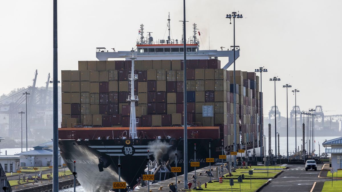 A container ship crosses the Cocoli Locks at the Panama Canal in Panama City, Panama, on Friday, Feb. 21, 2025. The Panama Canal's administration hired law firm Vinson & Elkins to defend the interests of the waterway amid rising tensions with the US around its management, La Prensa reported. Photographer: Tarina Rodriguez/Bloomberg via Getty Images