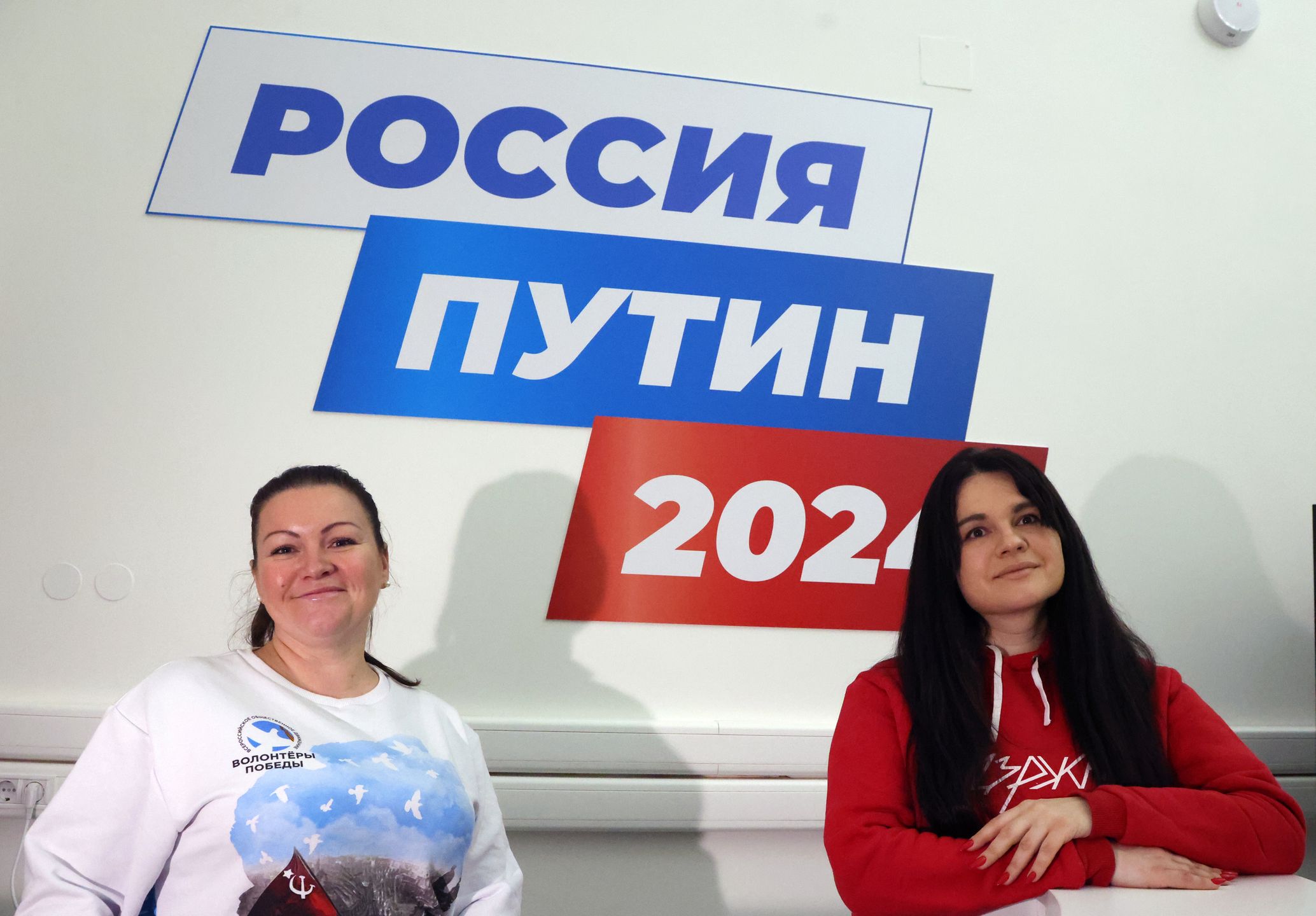 Russian President Vladimir Putin Inaugurates Election Campaign Headquarters In MoscowMOSCOW, RUSSIA - DECEMBER 21: (RUSSIA OUT) Volunteers pose for a photo in front of a sign on the wall that reads: "Russia. Putin. 2024" during the opening ceremony of the Election Campaign Headquarters of Vladimir Putin on December 21, 2023, in Moscow, Russia. Vladimir Putin is nominated as a candidate for the 2023 Presidential Elections. (Photo by Contributor/Getty Images)Contributor