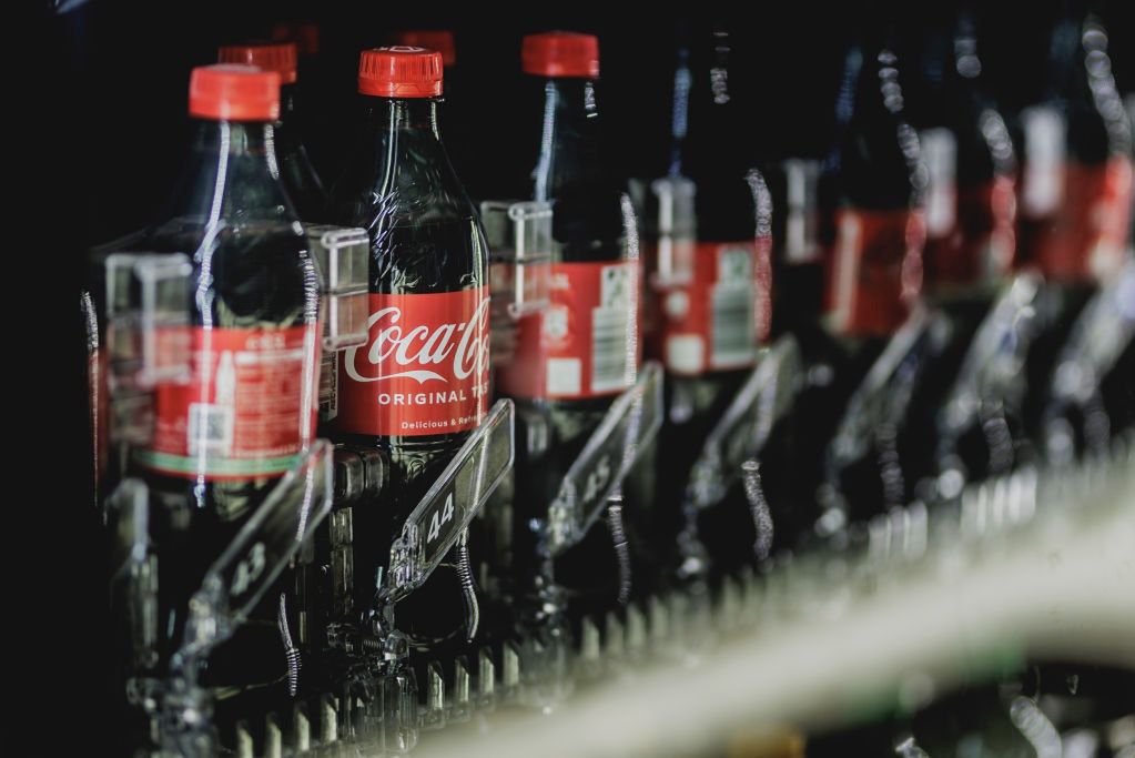Activists criticize Coca-Cola's change in packaging recycling plans.