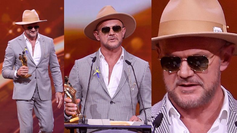 Wiktory 2022. Cezary Pazura w kapeluszu i okularach przeciwsłonecznych 