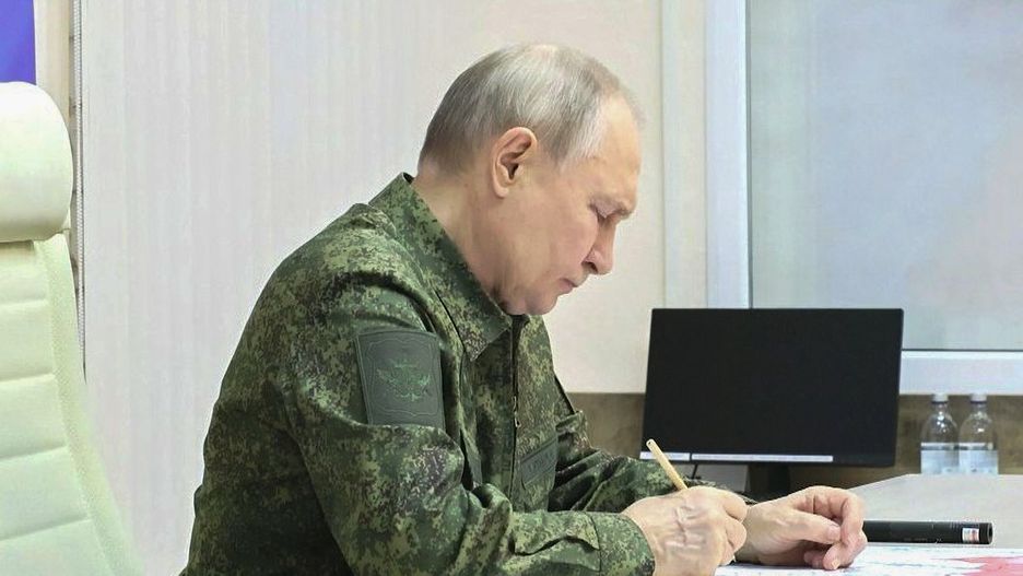 KURSK, RUSSIA - MARCH 12: (----EDITORIAL USE ONLY - MANDATORY CREDIT - 'KREMLIN PRESS OFFICE / HANDOUT' - NO MARKETING NO ADVERTISING CAMPAIGNS - DISTRIBUTED AS A SERVICE TO CLIENTS----) A screen grab from a video shows Russian President Vladimir Putin, dressed in military uniform, visited a command post in Kursk, Russia on March 12, 2025. (Photo by Kremlin Press Office / Handout/Anadolu via Getty Images)