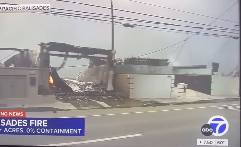 Paris Hilton watched her burning house on television.