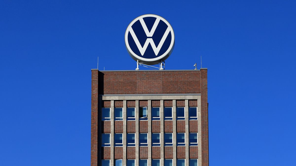 The logo of Volkswagen AG (VW) on an administrative building at the automaker's headquarters and auto plant complex in Wolfsburg, Germany, on Tuesday, Feb. 28, 2023. Volkswagen wants to remain a strong player in Europe and China, but in the face of growing geopolitical tensions and an increasingly complex regulatory environment, the German carmaker is looking beyond the US for markets with growth potential. Photographer: Krisztian Bocsi/Bloomberg via Getty Images